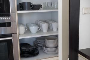 Kuchyňa alebo kuchynka v ubytovaní Royal Wilanów 2-bedroom Apartment