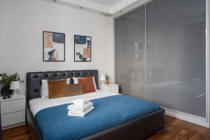 Posteľ alebo postele v izbe v ubytovaní Royal Wilanów 2-bedroom Apartment