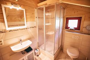a bathroom with a shower and a sink at EifelGlückVII in Rieden +14 photos