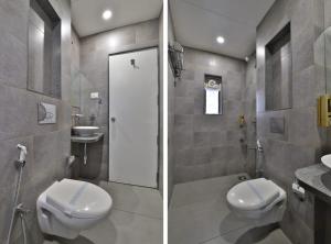 Koupelna v ubytování Hotel Limra Vadodara + 37 fotografií