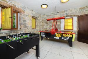 Herní místnost v ubytování Villa Denis Village in Central Istria for 28 people pet friendly complex of 4 stone houses