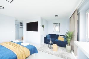 Posteľ alebo postele v izbe v ubytovaní WLR Apartments - Chmielna I