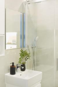 Kúpeľňa v ubytovaní WLR Apartments - Chmielna I