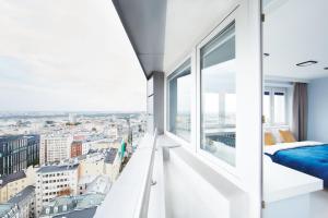 Posteľ alebo postele v izbe v ubytovaní WLR Apartments - Chmielna I
