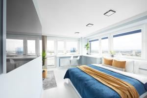 Posteľ alebo postele v izbe v ubytovaní WLR Apartments - Chmielna I