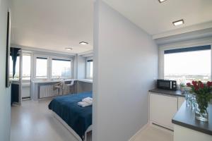 Posteľ alebo postele v izbe v ubytovaní WLR Apartments - Chmielna I