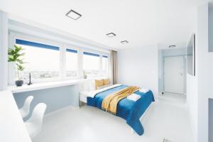 Posteľ alebo postele v izbe v ubytovaní WLR Apartments - Chmielna I