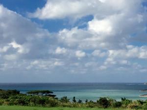 a view of the ocean under a cloudy sky at Joya in Ishigaki Island