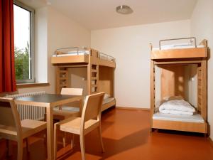 Postel nebo postele na pokoji v ubytování Youth Hostel Luxembourg City