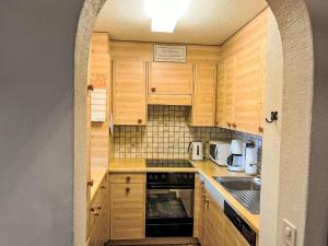 Kuchyň nebo kuchyňský kout v ubytování Apartment Toissa A4 by Interhome