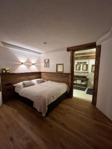 Posteľ alebo postele v izbe v ubytovaní Tirol Chalet Brixen