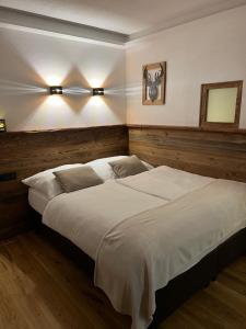 Posteľ alebo postele v izbe v ubytovaní Tirol Chalet Brixen