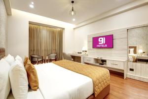 TV a/nebo společenská místnost v ubytování Hotel 91 Millennium Huda