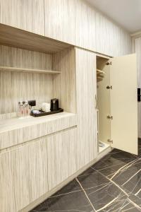 Kuchyň nebo kuchyňský kout v ubytování Hotel 91 Millennium Huda