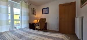 Postel nebo postele na pokoji v ubytování Ferienwohnung LFR18 Brise