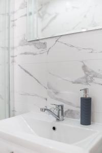 Koupelna v ubytování Widokowe Wzgórze pokoje w Polańczyku + 3 fotografie