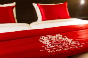 Postel nebo postele na pokoji v ubytování Van der Valk Hotel Avifauna