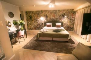 Postel nebo postele na pokoji v ubytování Van der Valk Hotel Avifauna