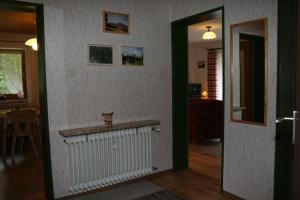 a room with a wall with a bar on it at Haus Auzinger in Schönau am Königssee