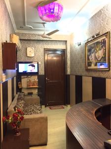 TV a/nebo společenská místnost v ubytování Krishna Inn + 18 fotografií
