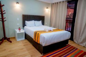 Postel nebo postele na pokoji v ubytování Hotel Chaska Illary Pisac
