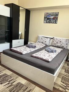 Ένα ή περισσότερα κρεβάτια σε δωμάτιο στο Olympia Residence