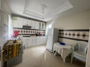 Kuchyň nebo kuchyňský kout v ubytování Appartement Monaco