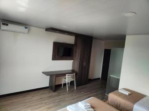 TV a/nebo společenská místnost v ubytování Hotel Punta Azul