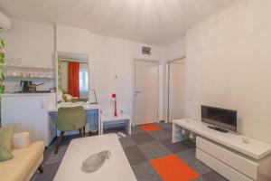 TV o dispositivi per l'intrattenimento presso Apartmani Maximilian