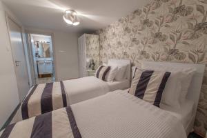 Letto o letti in una camera di Apartmani Maximilian