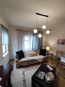 Ένα ή περισσότερα κρεβάτια σε δωμάτιο στο Traditional House L&A Korçë