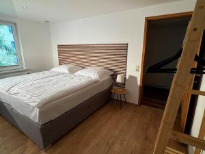 Postel nebo postele na pokoji v ubytování City Apartments Bludenz