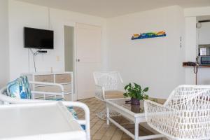 Μια τηλεόραση ή/και κέντρο ψυχαγωγίας στο Condominio Puntepiedra - Apartamentos