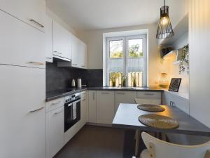 Kuchyň nebo kuchyňský kout v ubytování Studio-Apartment Sophia