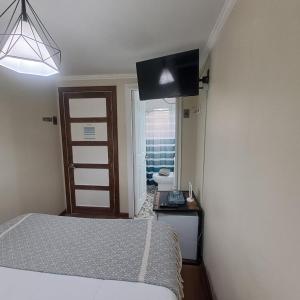 Cama ou camas em um quarto em Hostal Terraza Recreo