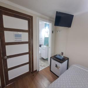 Cama ou camas em um quarto em Hostal Terraza Recreo