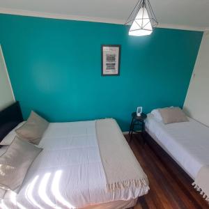 Cama ou camas em um quarto em Hostal Terraza Recreo