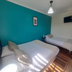 Cama ou camas em um quarto em Hostal Terraza Recreo