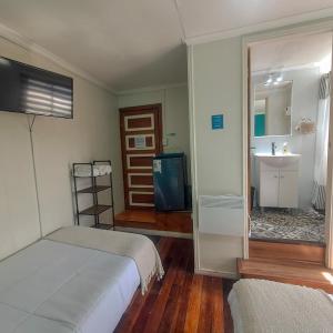 Cama ou camas em um quarto em Hostal Terraza Recreo