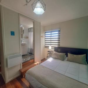 Cama ou camas em um quarto em Hostal Terraza Recreo