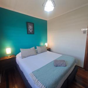 Cama ou camas em um quarto em Hostal Terraza Recreo