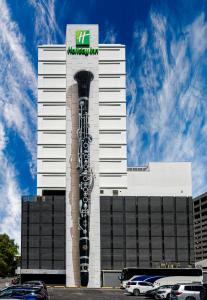 a building with a sign on the side of it at Holiday Inn New Orleans-Downtown Superdome by IHG in New Orleans
