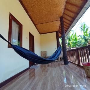 Tangga Bungalows Gili Air的阳台或露台
