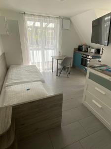 Kuchyň nebo kuchyňský kout v ubytování hochwertiges Studio in bester Lage