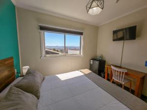 Cama ou camas em um quarto em Hostal Terraza Recreo