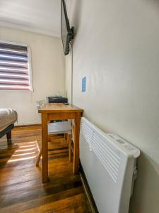 Cama ou camas em um quarto em Hostal Terraza Recreo