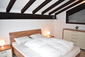 Postel nebo postele na pokoji v ubytování La Schmetta 38 + 14 fotografií