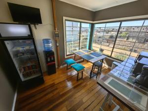 Uma TV ou centro de entretenimento em Hostal Terraza Recreo