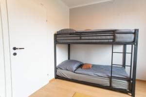 Postel nebo postele na pokoji v ubytování Freiraum im Univiertel und in Seenähe