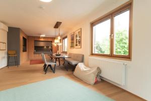 Posezení v ubytování Freiraum im Univiertel und in Seenähe